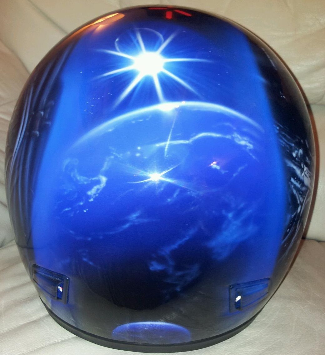 Airbrushed Painting of Alien vs Predator Helmet design with Alien on one side and Predator on the other Close upof rear with shot of Earth